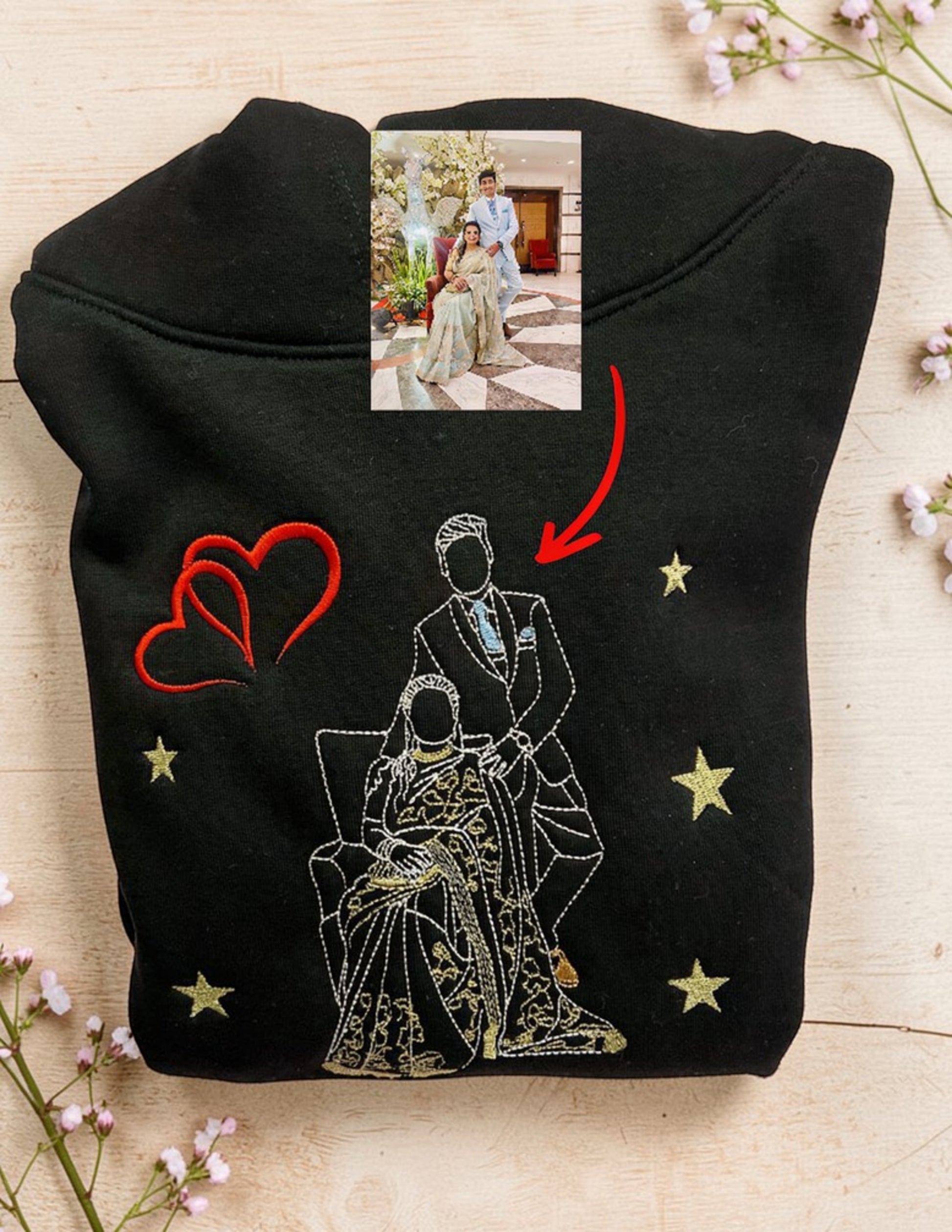 Love Craft black 100% cotton hoodie with custom embroidered outline of a couple and red hearts.